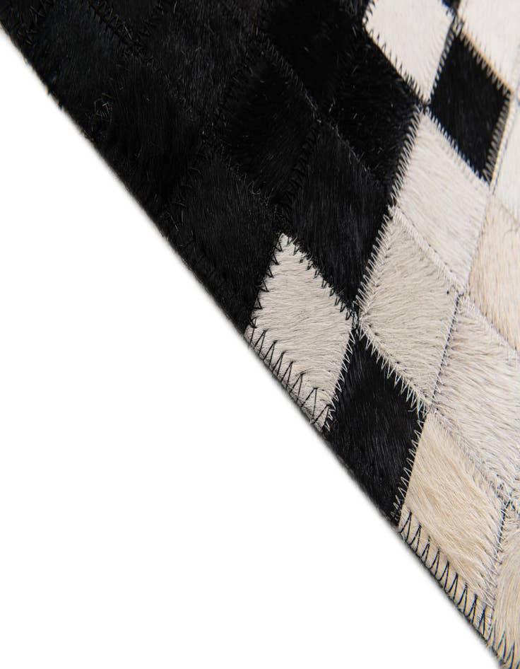 Detail image of  5' x 8' Cowhide Stocks Rug