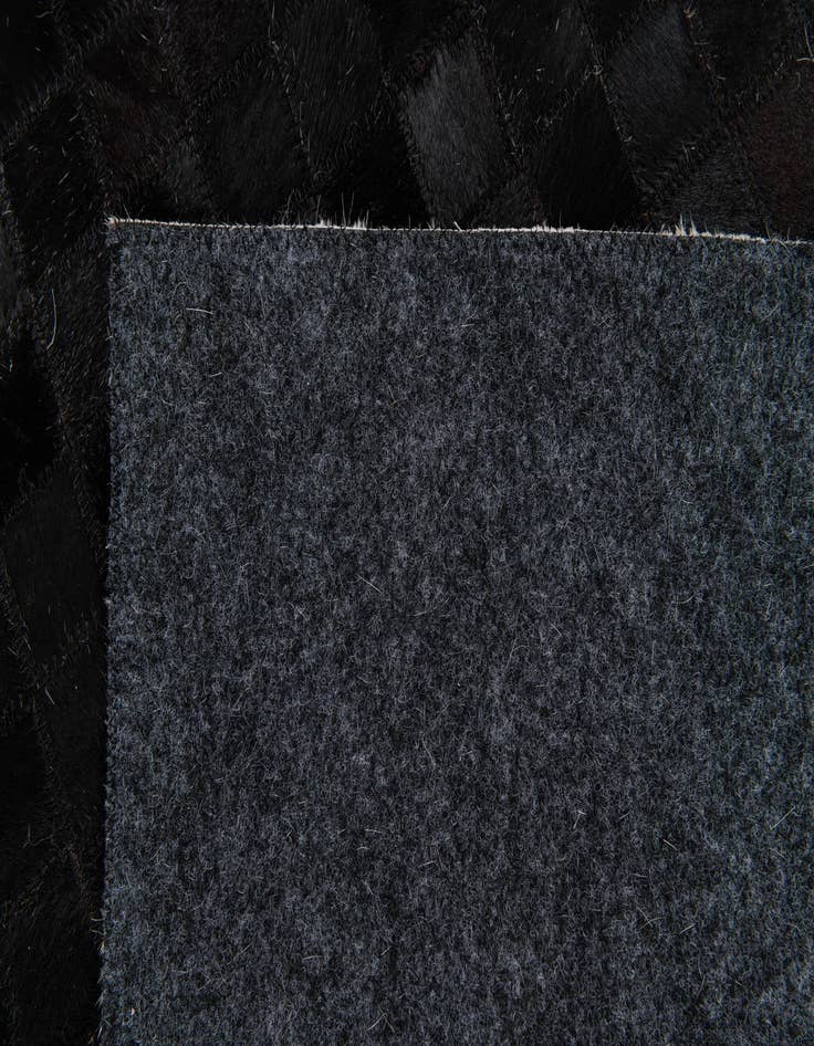 Detail image of  5' x 8' Cowhide Stocks Rug