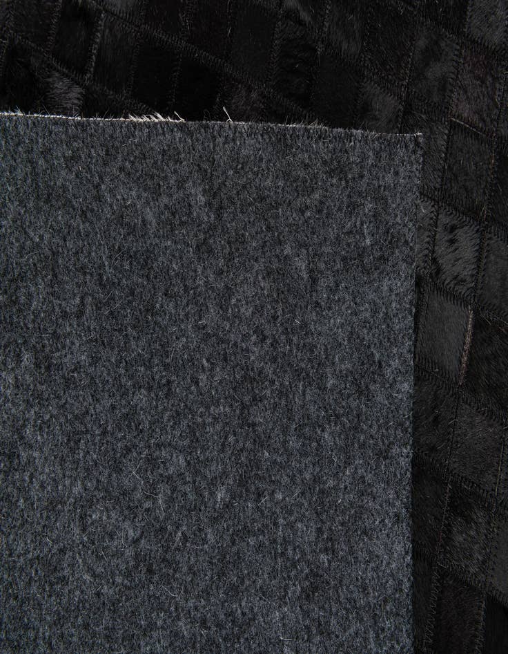 Detail image of  5' 1 x 8' 1 Cowhide Stocks Rug