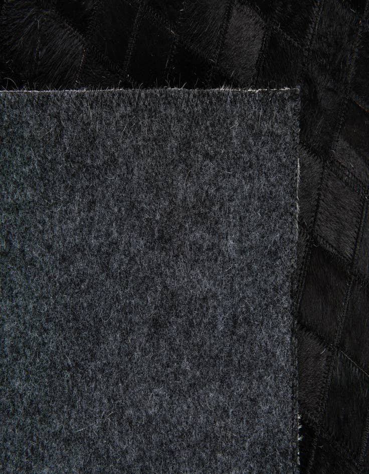 Detail image of  5' x 8' Cowhide Stocks Rug