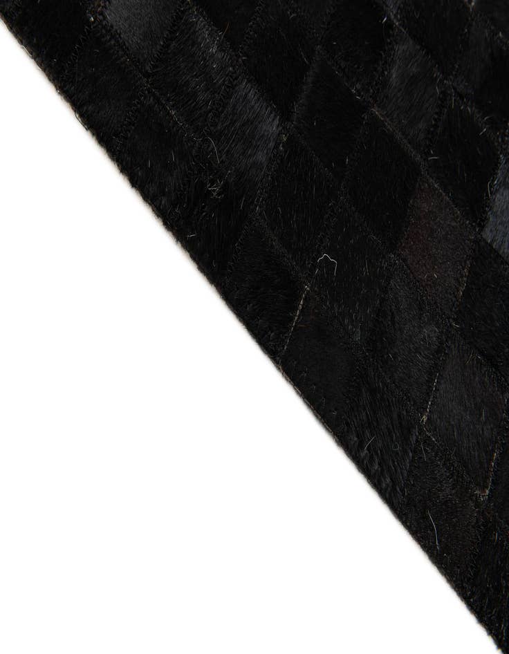 Detail image of  5' x 7' 11 Cowhide Stocks Rug