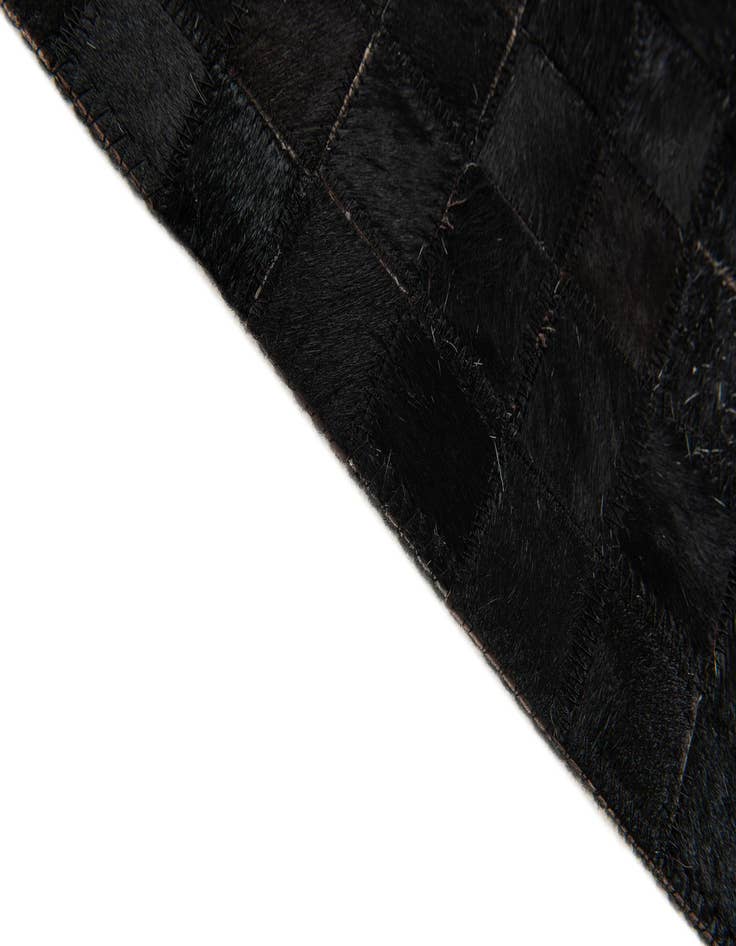 Detail image of  5' x 7' 11 Cowhide Stocks Rug