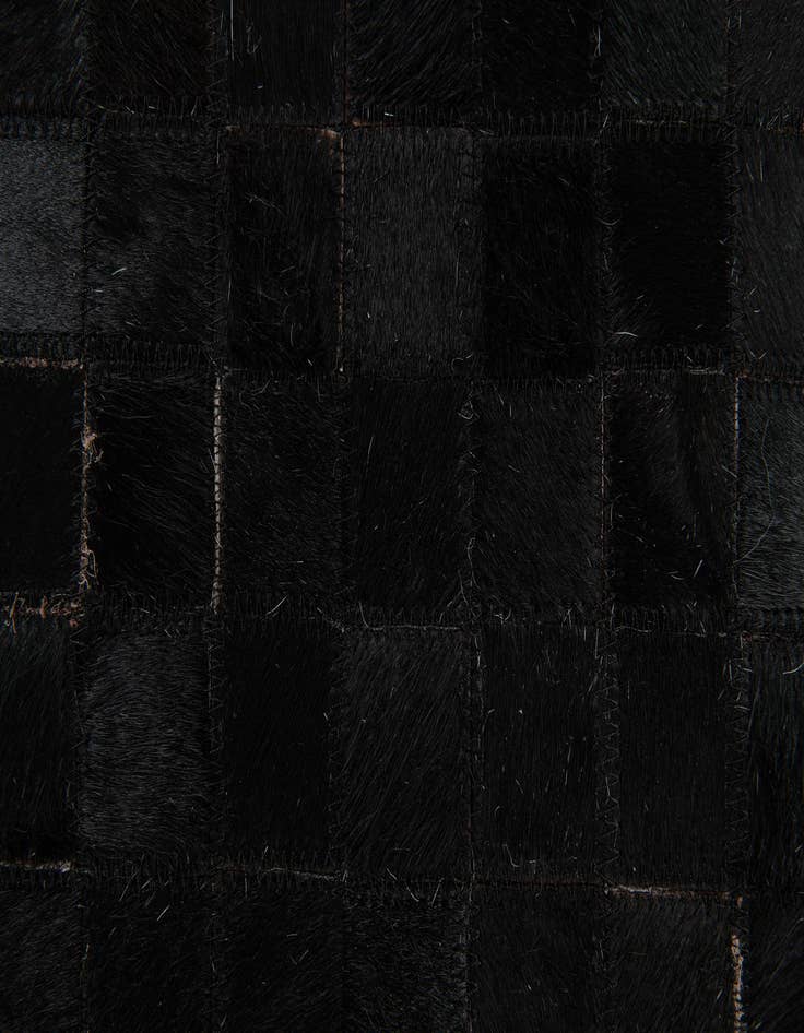 Detail image of  5' x 7' 11 Cowhide Stocks Rug