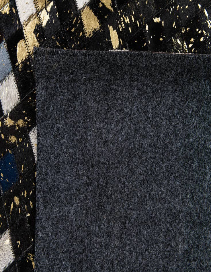 Detail image of  5' 1 x 7' 11 Cowhide Stocks Rug