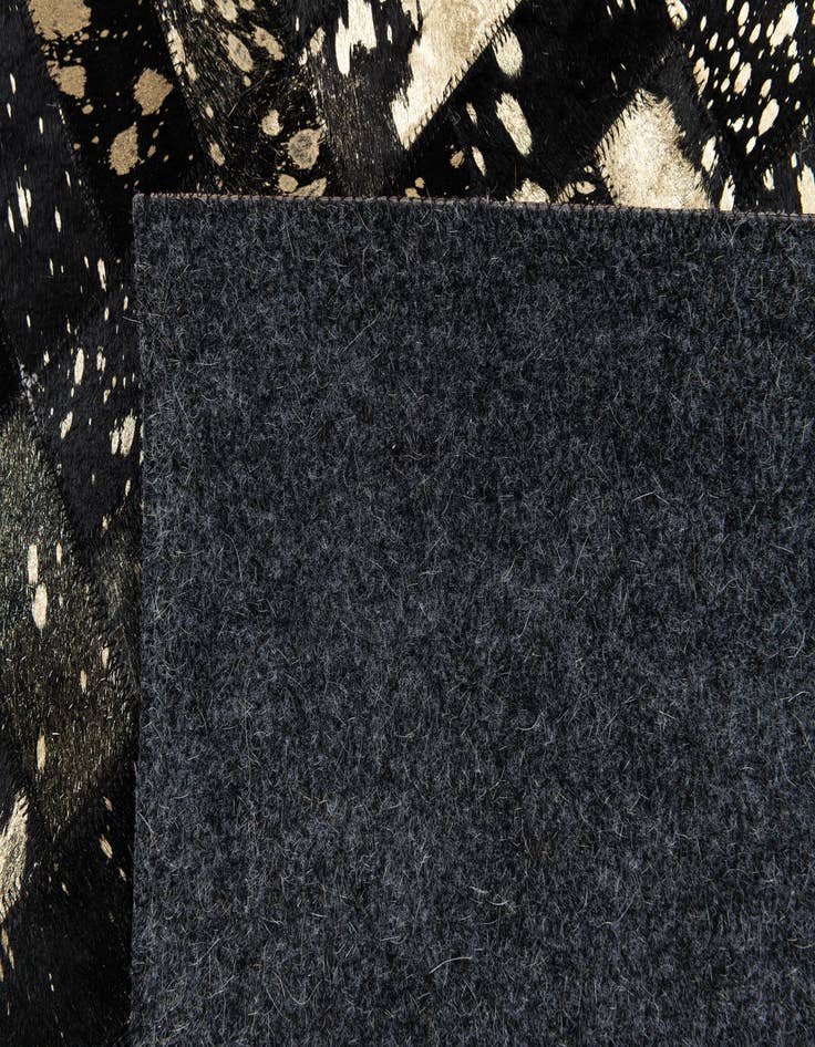 Detail image of  5' x 7' 11 Cowhide Stocks Rug