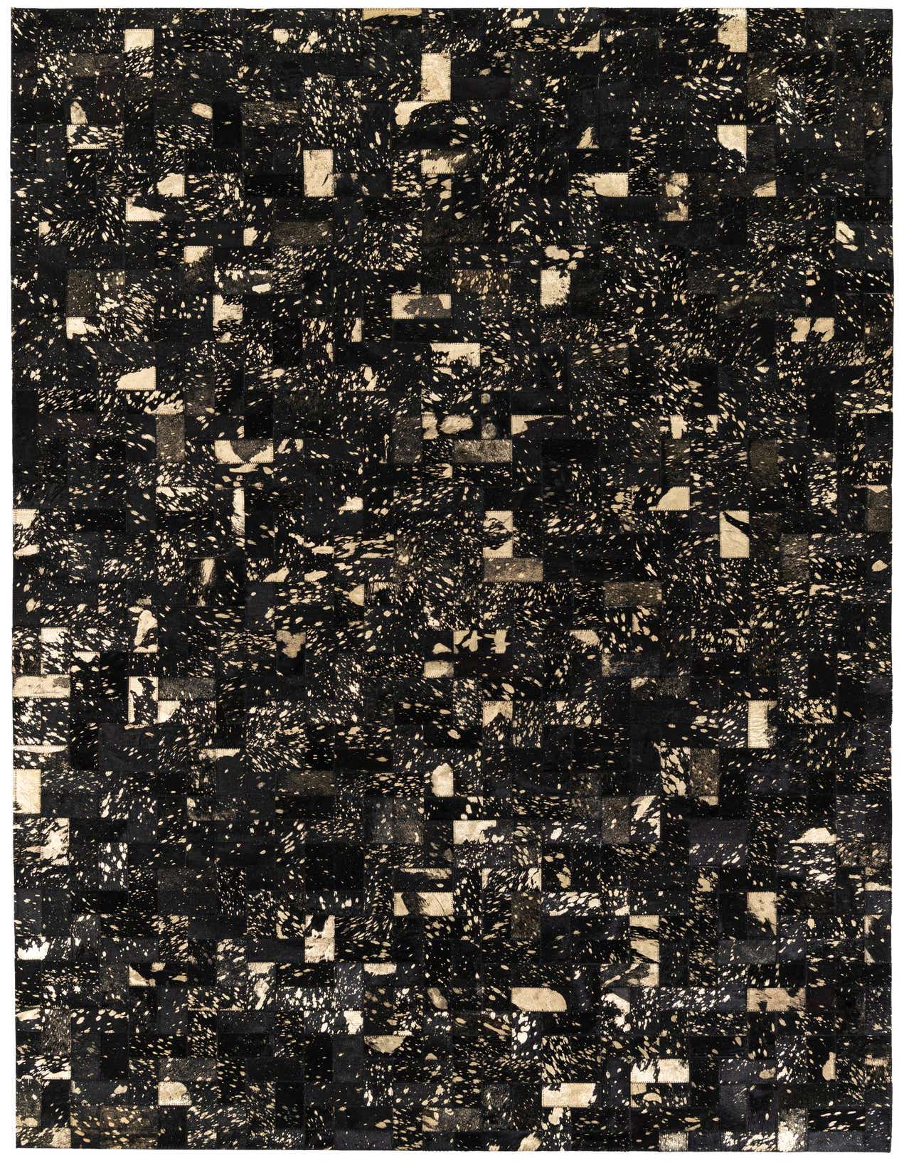 A rectangular 5x8 black modern cowhide rug with a splattered white and beige pattern, ideal for a living room.