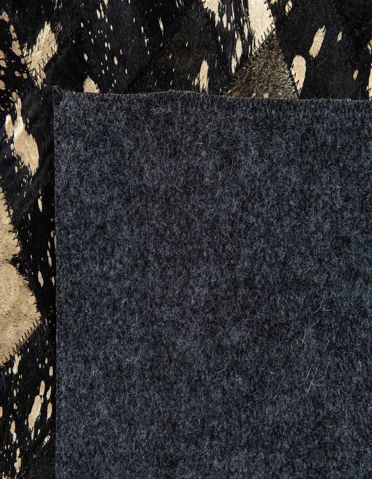 Detail image of  5' x 7' 11 Cowhide Stocks Rug