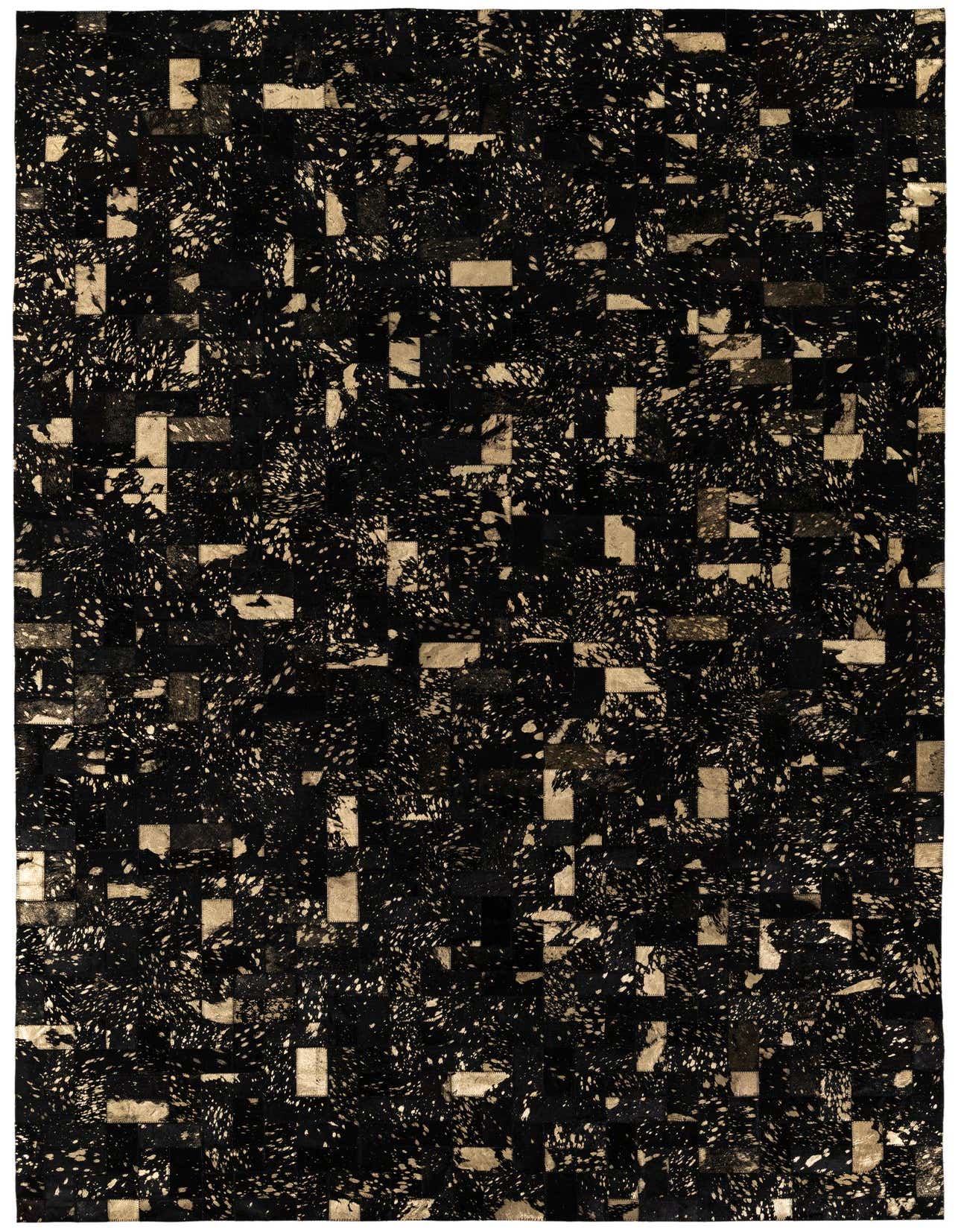 A rectangular 5x8 black modern cowhide rug with an abstract speckled pattern and light brown patches.