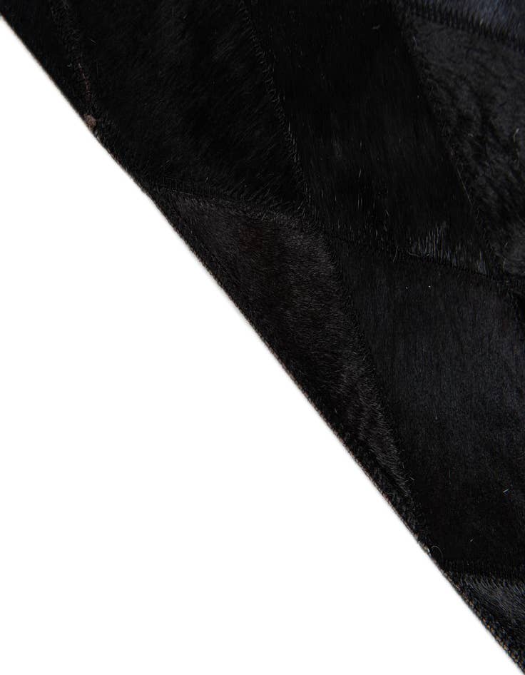 Detail image of  6' 6 x 9' 10 Cowhide Stocks Rug