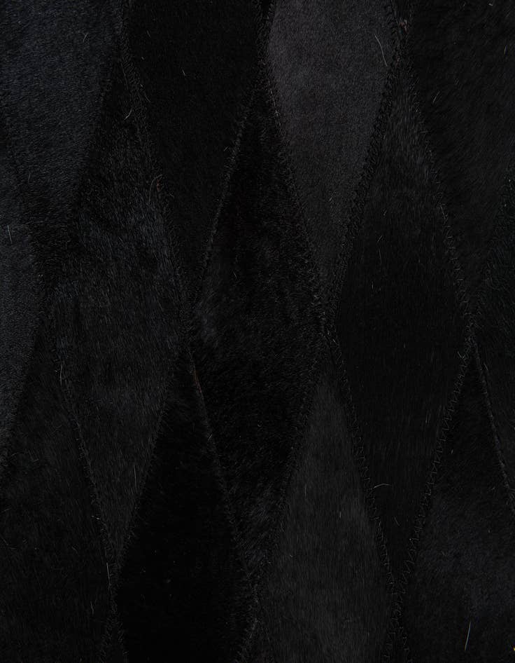 Detail image of  6' 6 x 9' 10 Cowhide Stocks Rug