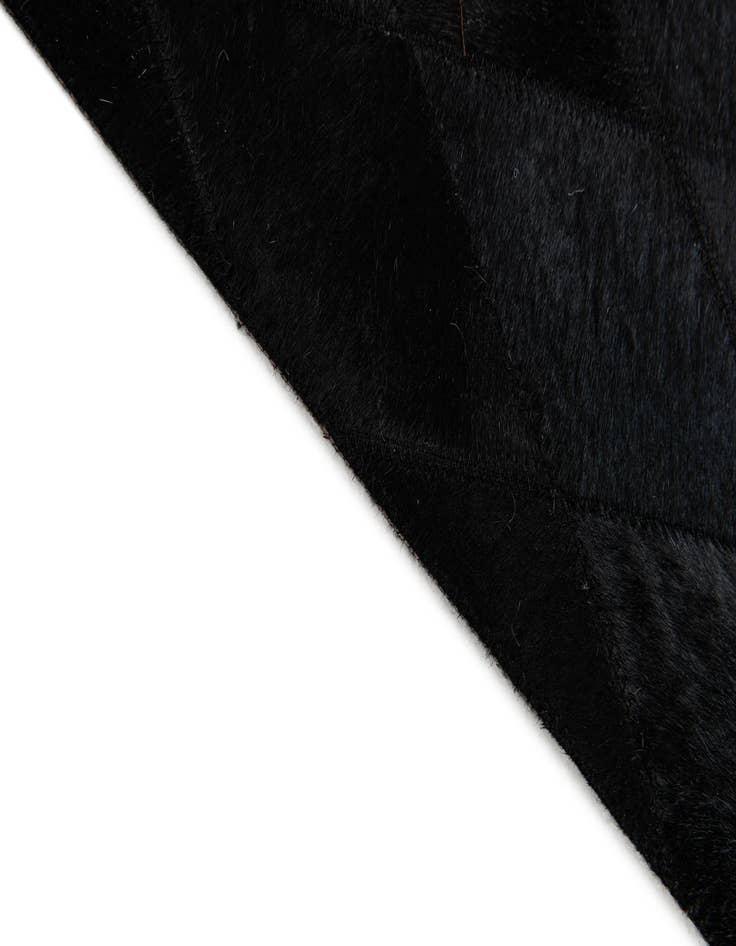 Detail image of  6' 6 x 9' 10 Cowhide Stocks Rug