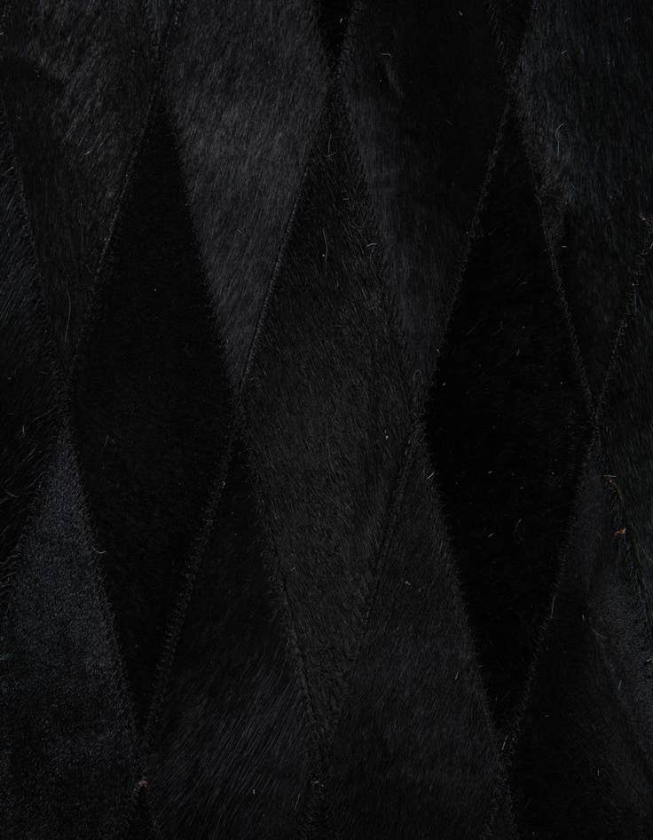 Detail image of  6' 6 x 9' 10 Cowhide Stocks Rug