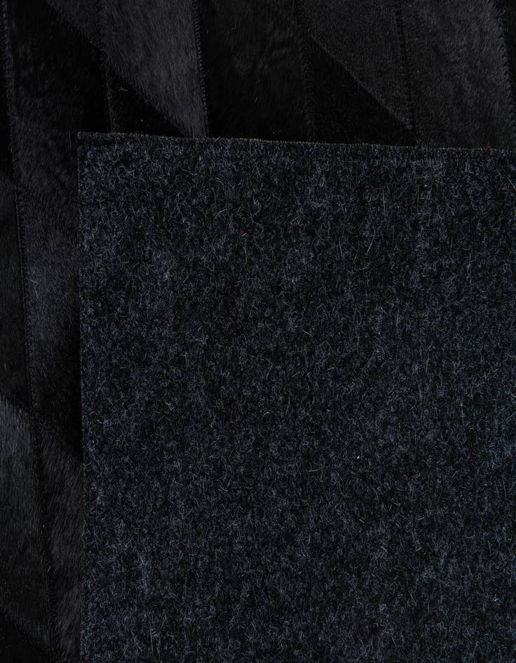 Detail image of  6' 6 x 9' 10 Cowhide Stocks Rug