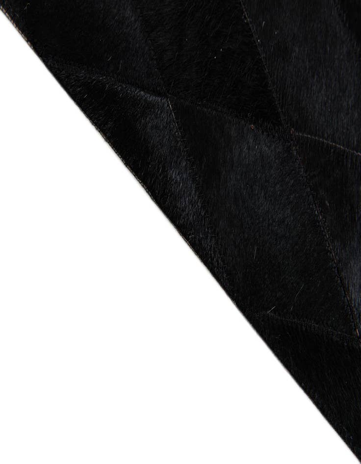 Detail image of  6' 6 x 9' 8 Cowhide Stocks Rug