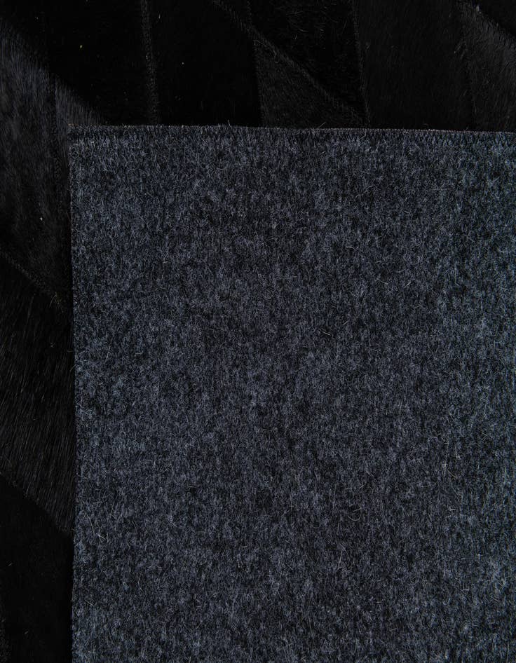 Detail image of  6' 6 x 9' 8 Cowhide Stocks Rug