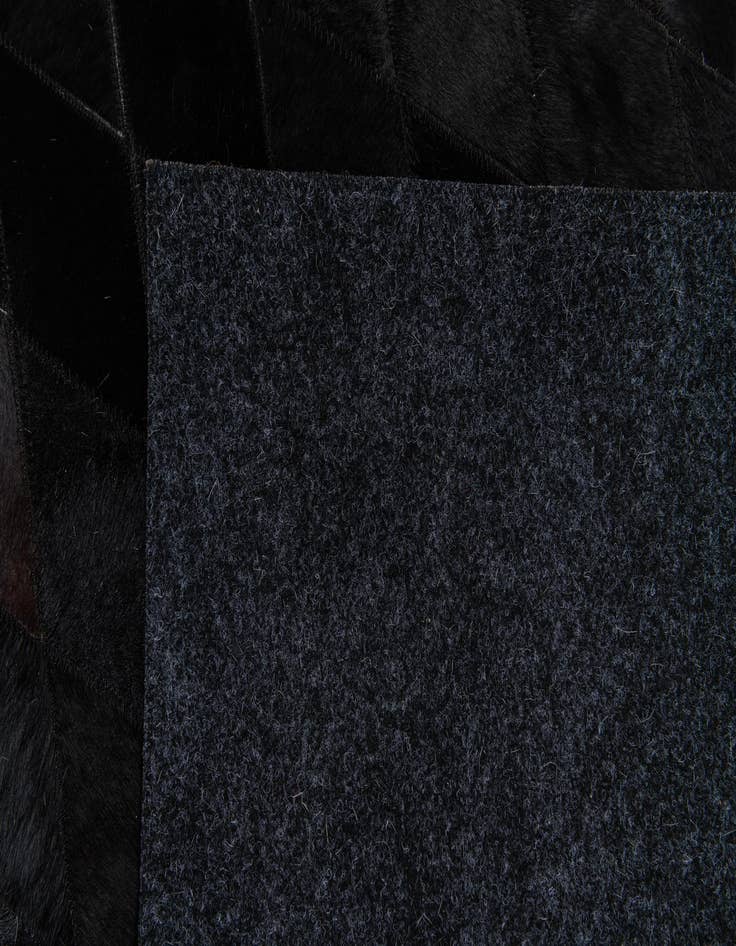 Detail image of  6' 7 x 9' 9 Cowhide Stocks Rug