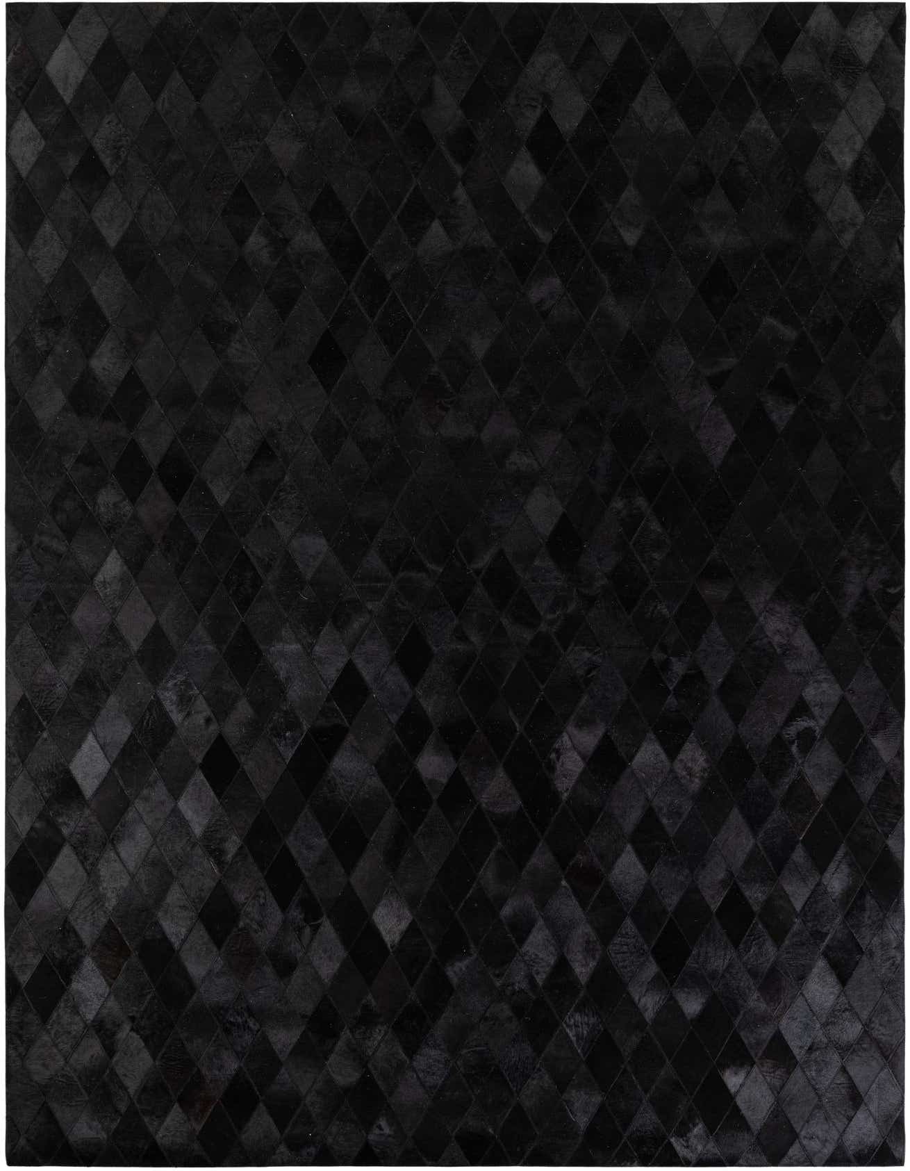 A 7x10 rectangular black modern cowhide rug with a subtle diamond pattern, perfect for a living room.
