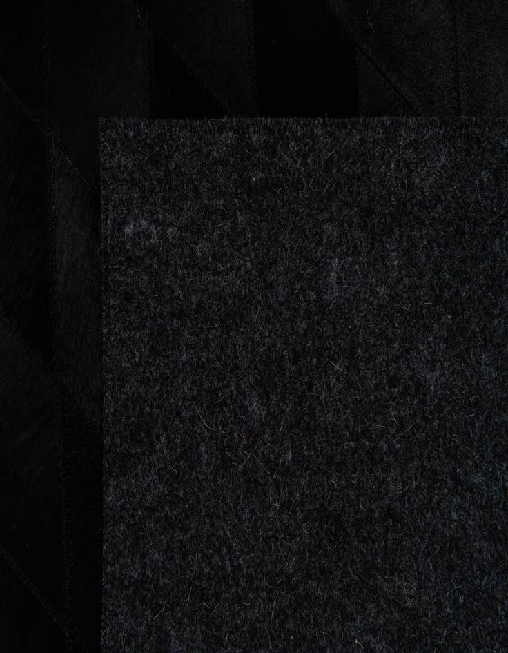 Detail image of  4' 7 x 6' 6 Cowhide Stocks Rug