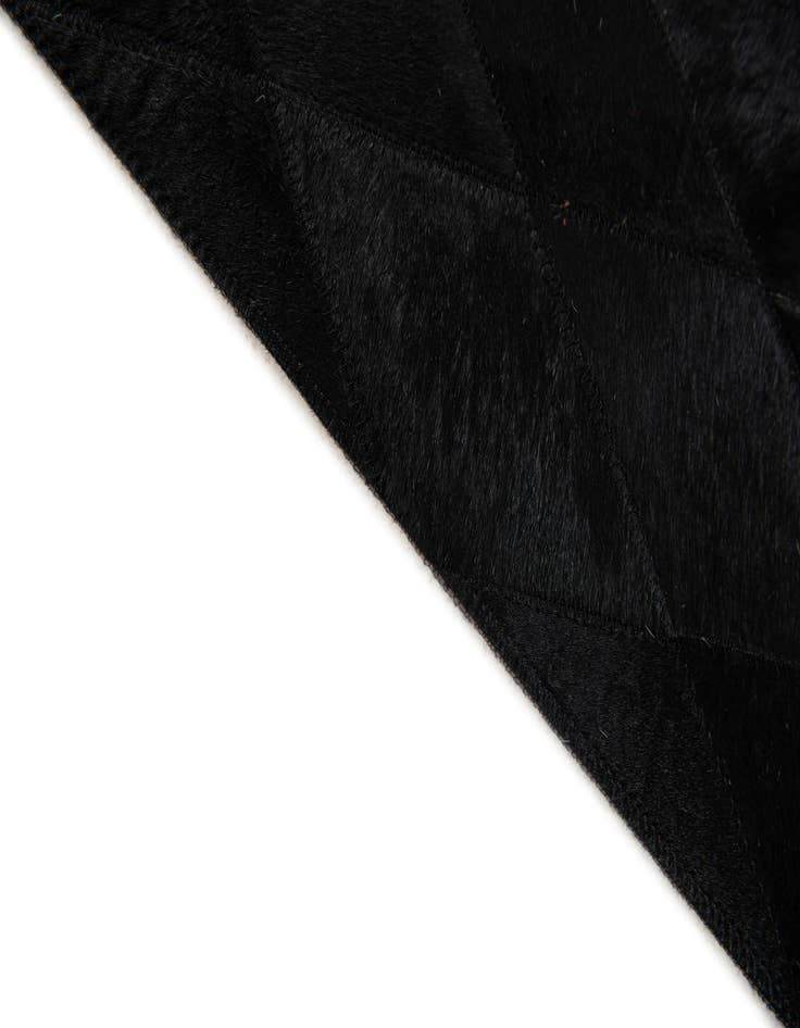 Detail image of  4' 7 x 6' 5 Cowhide Stocks Rug