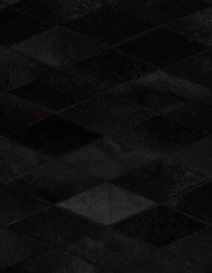 Detail image of  4' 7 x 6' 5 Cowhide Stocks Rug