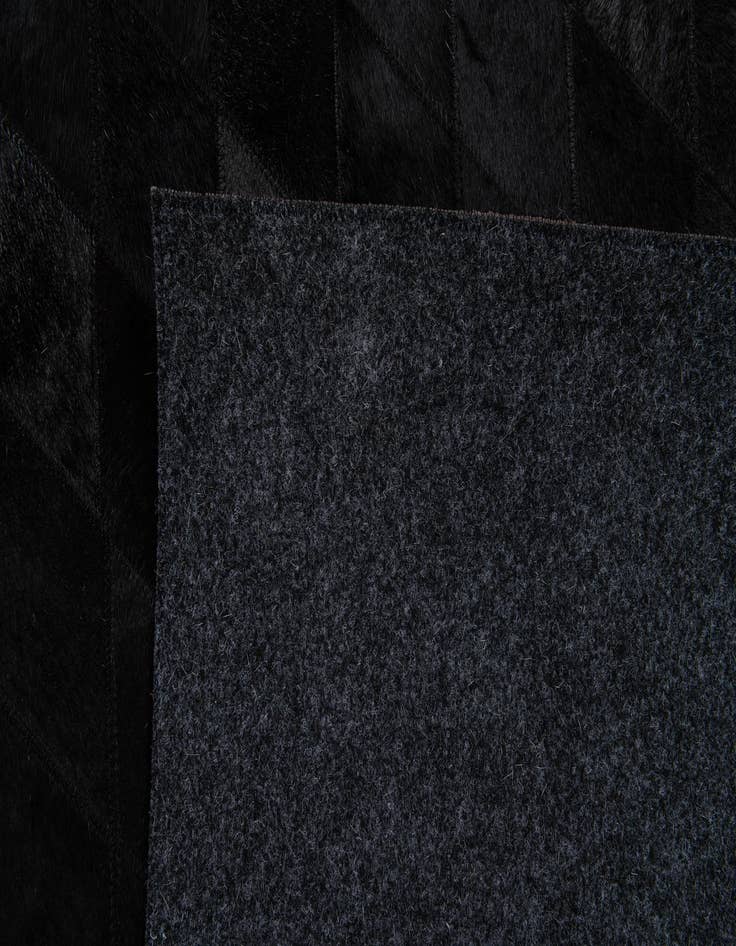 Detail image of  4' 7 x 6' 8 Cowhide Stocks Rug