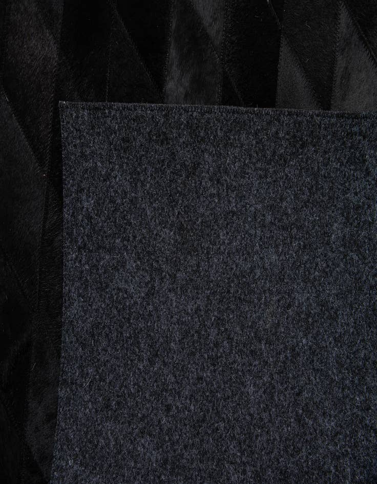 Detail image of  4' 7 x 6' 8 Cowhide Stocks Rug