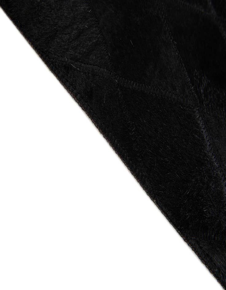 Detail image of  4' 7 x 6' 6 Cowhide Stocks Rug