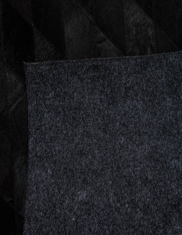 Detail image of  4' 7 x 6' 6 Cowhide Stocks Rug