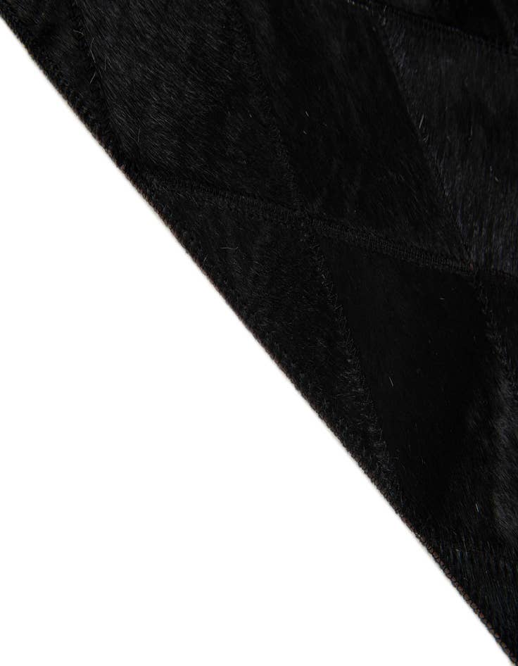 Detail image of  4' 8 x 6' 7 Cowhide Stocks Rug