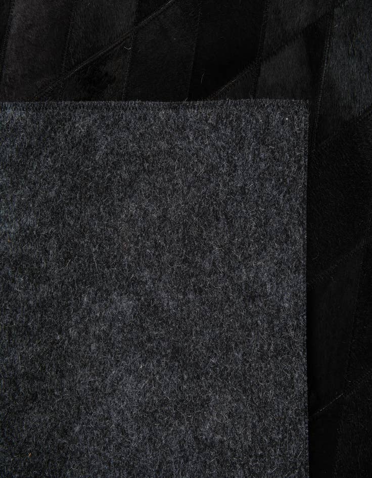 Detail image of  4' 8 x 6' 7 Cowhide Stocks Rug