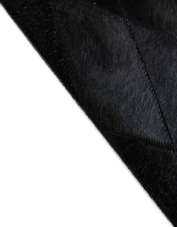 Detail image of  4' 7 x 6' 5 Cowhide Stocks Rug