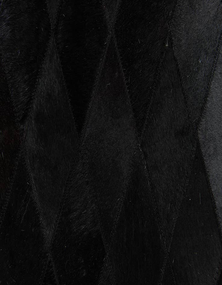 Detail image of  4' 7 x 6' 5 Cowhide Stocks Rug