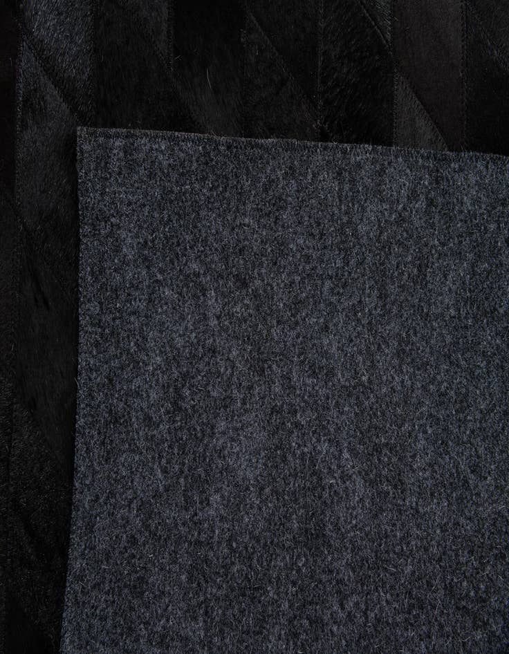 Detail image of  4' x 5' 10 Cowhide Stocks Rug