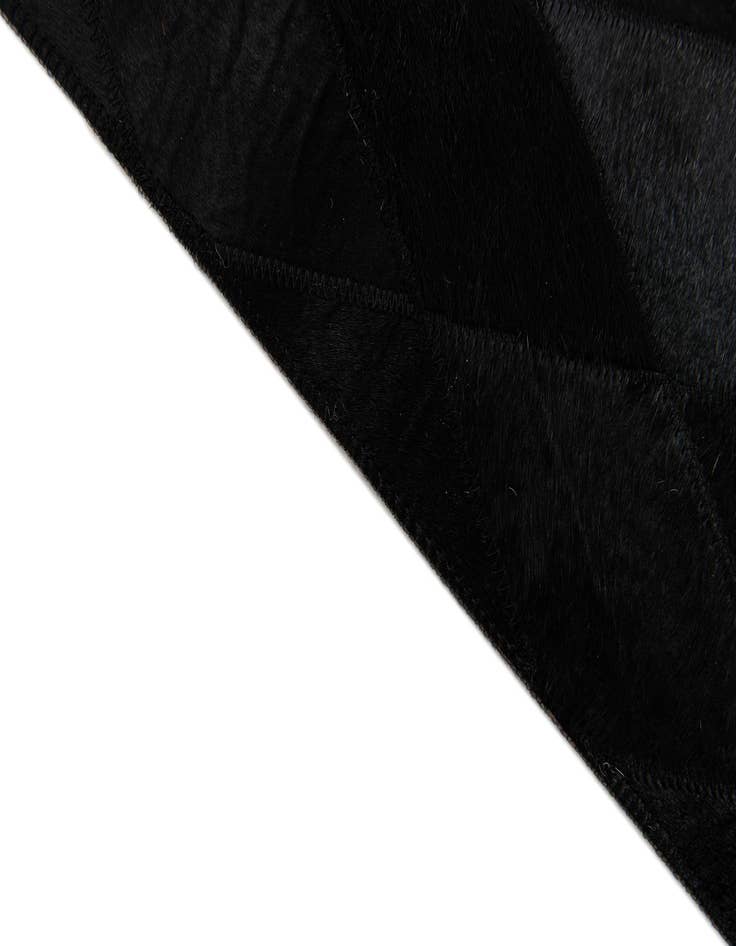 Detail image of  3' 11 x 5' 10 Cowhide Stocks Rug