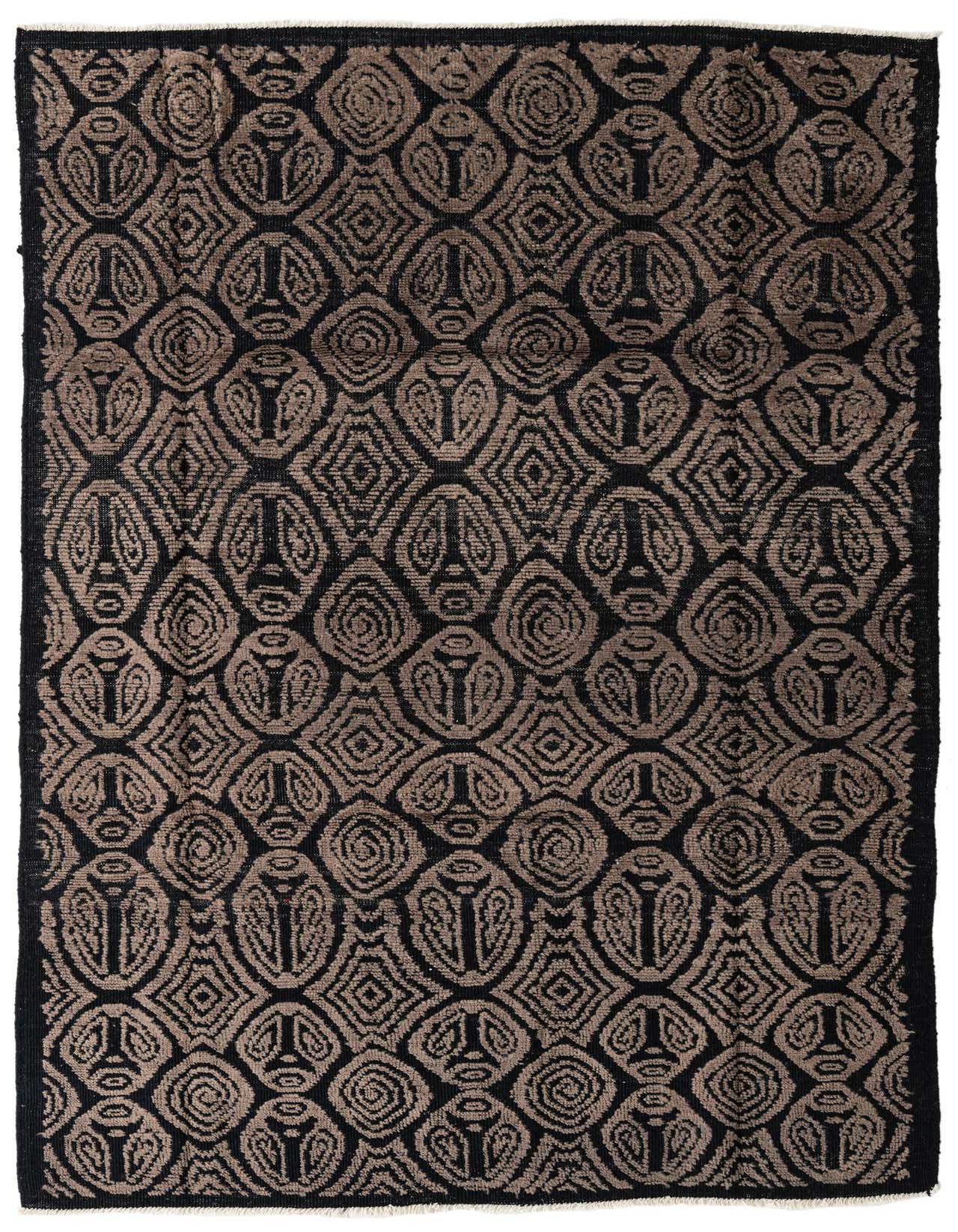 A 6x9 rectangular Darya rug with a high pile, featuring a modern abstract pattern in black and dark brown tones.