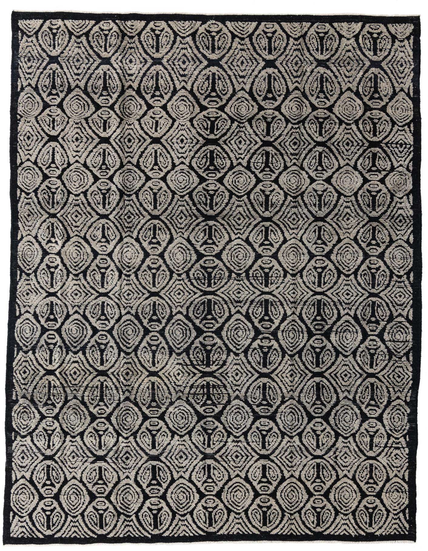 A 9x12 rectangular Darya rug in black and off-white with a modern oriental geometric pattern, suitable for a living room.