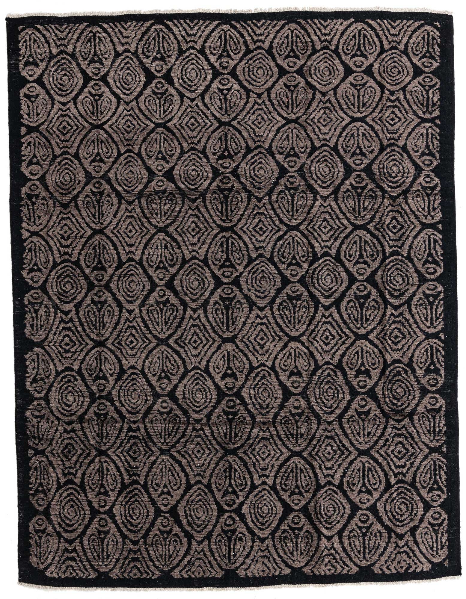 A rectangular 8x10 black wool area rug with a high pile, featuring an abstract modern pattern in varying shades of black and dark gray.