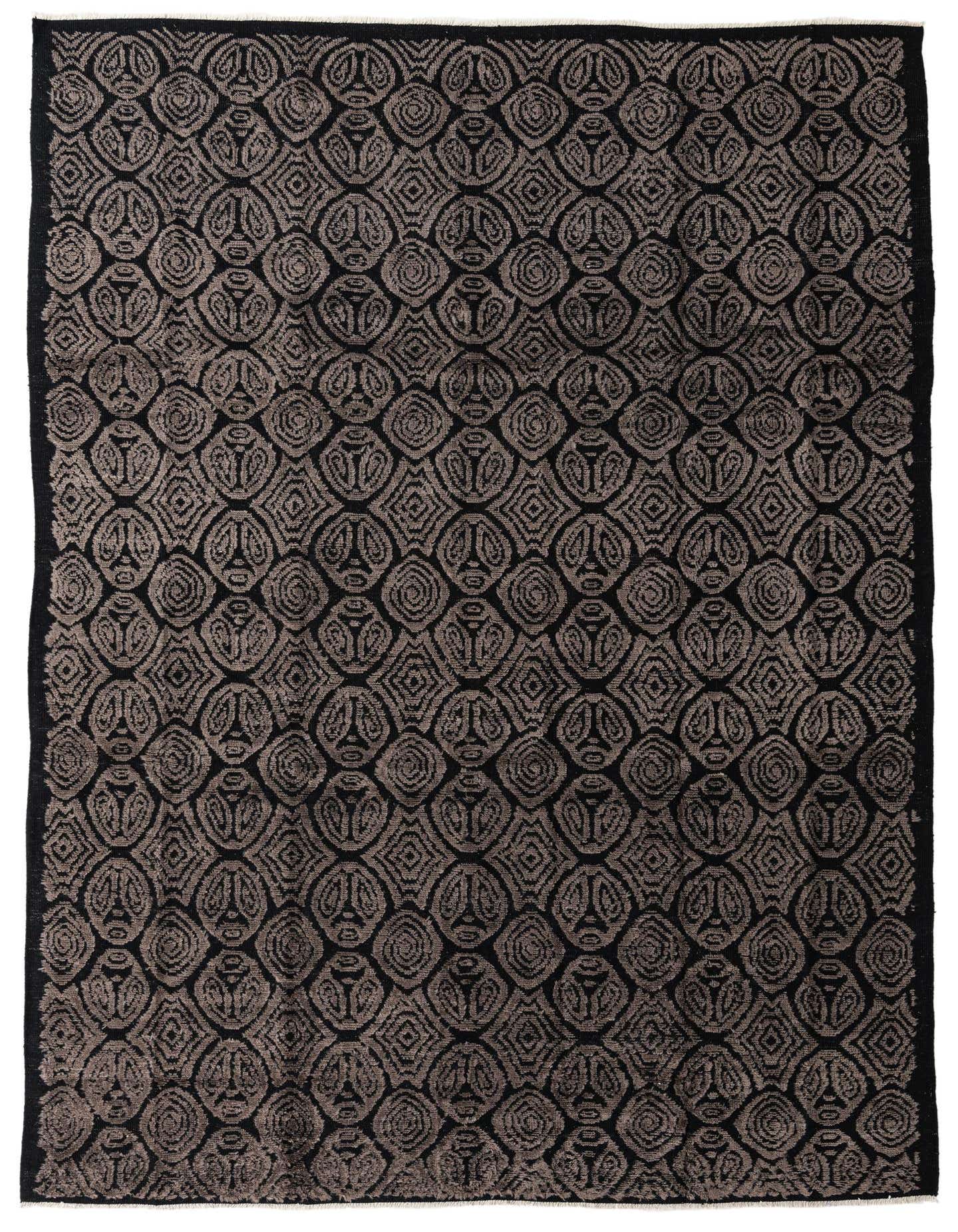 A 9x12 rectangular Darya rug with a high pile, featuring a modern abstract pattern in black and dark gray.