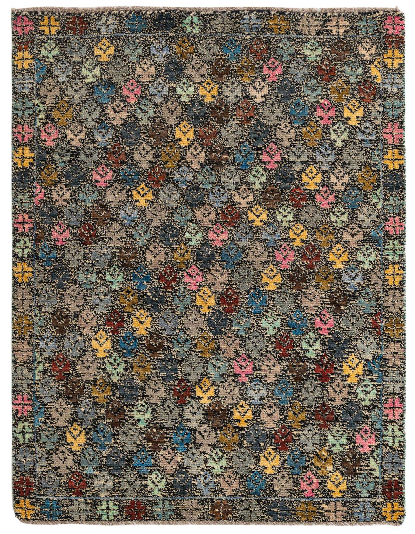 A 4x6 rectangular Darya rug with a black base and a colorful abstract pattern of small, varied shapes in pink, blue, yellow, and red.