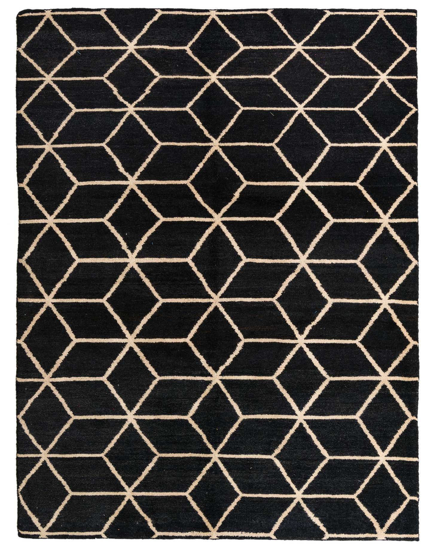 A 6x9 rectangular black wool area rug featuring a modern abstract geometric pattern of interconnected beige hexagonal shapes.
