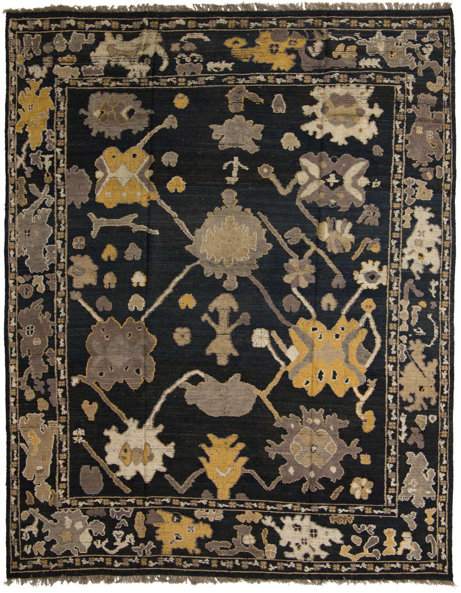 A 10x14 rectangular black wool area rug featuring a modern abstract floral and geometric pattern in gold, grey, and cream.