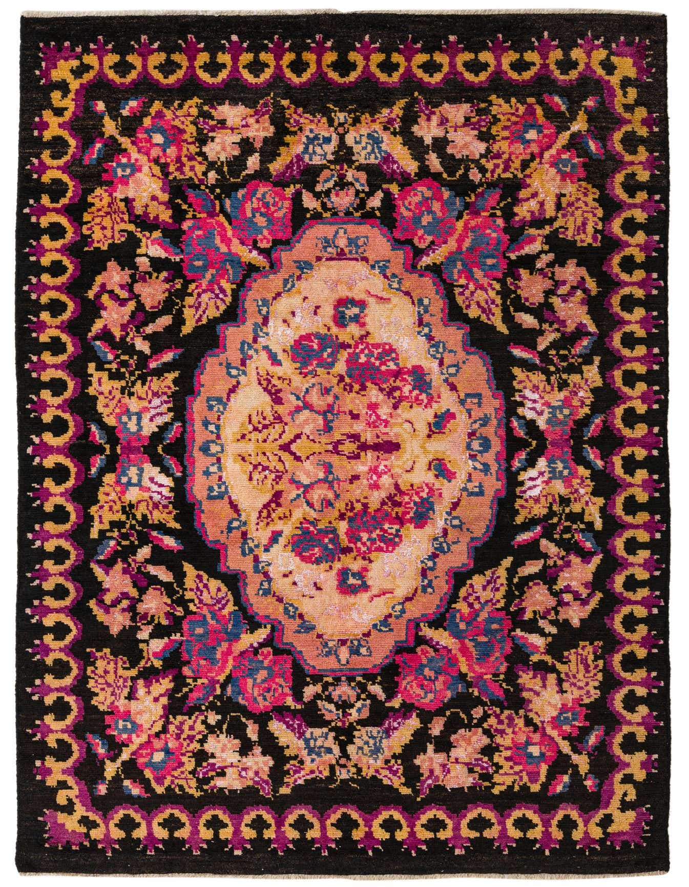 A 6x9 rectangular Darya rug with a black background, featuring a vibrant floral medallion in pink, blue, and gold.