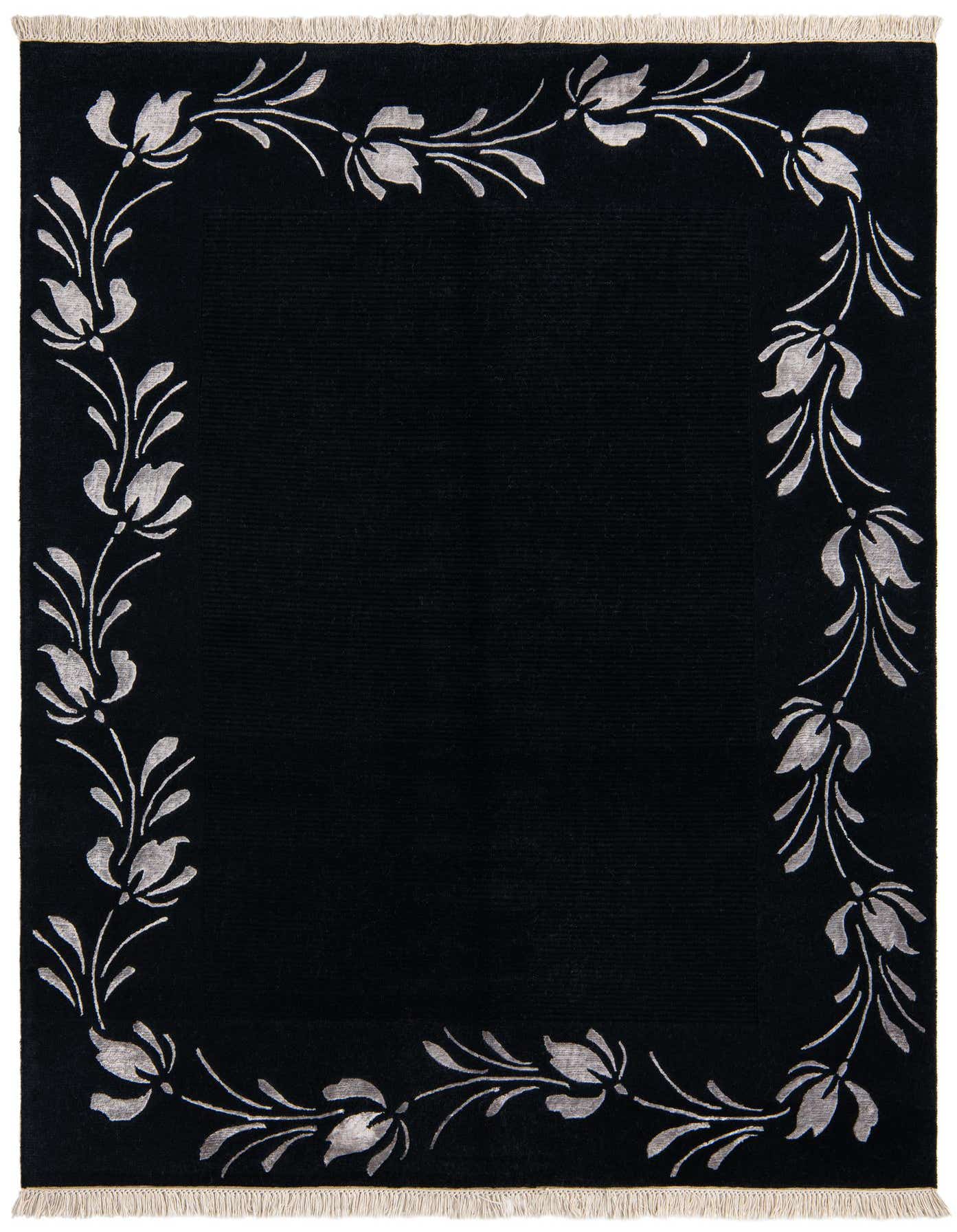 A 4x6 rectangular black wool rug with a light grey modern floral border and short white fringe.