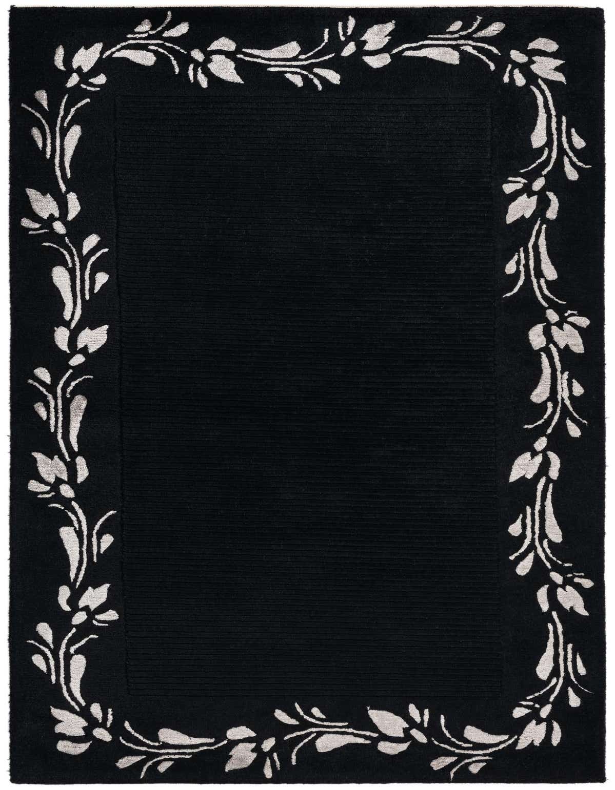 A 3x5 rectangular black wool rug with a high pile and a light grey modern floral border pattern.