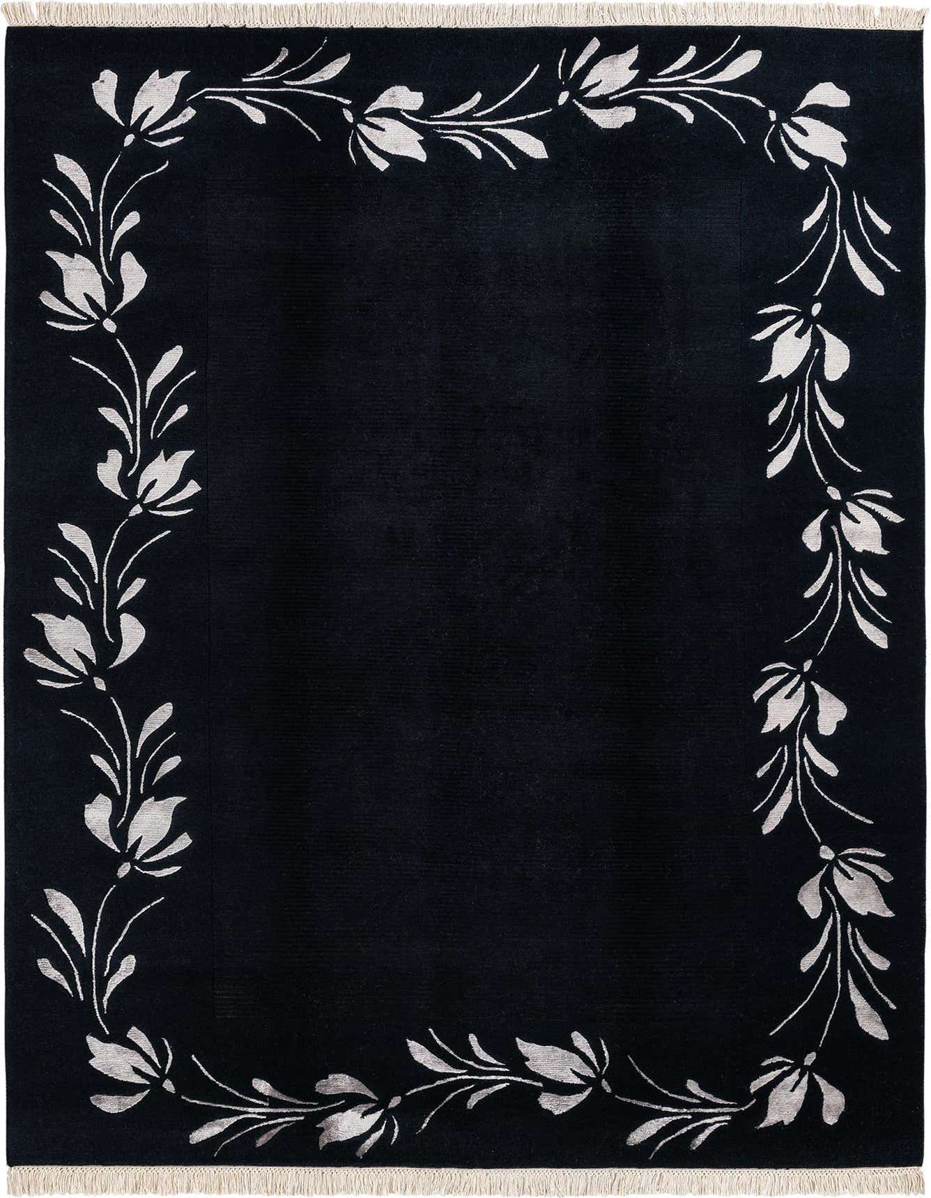 A 5x8 rectangular black area rug with a modern Persian floral border in light grey, featuring a high pile and fringe.
