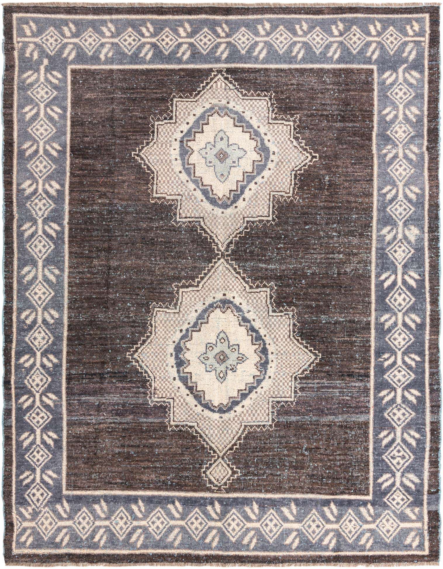 A rectangular 8x11 black wool rug with two large light gray and blue medallion patterns and a decorative blue and white border.