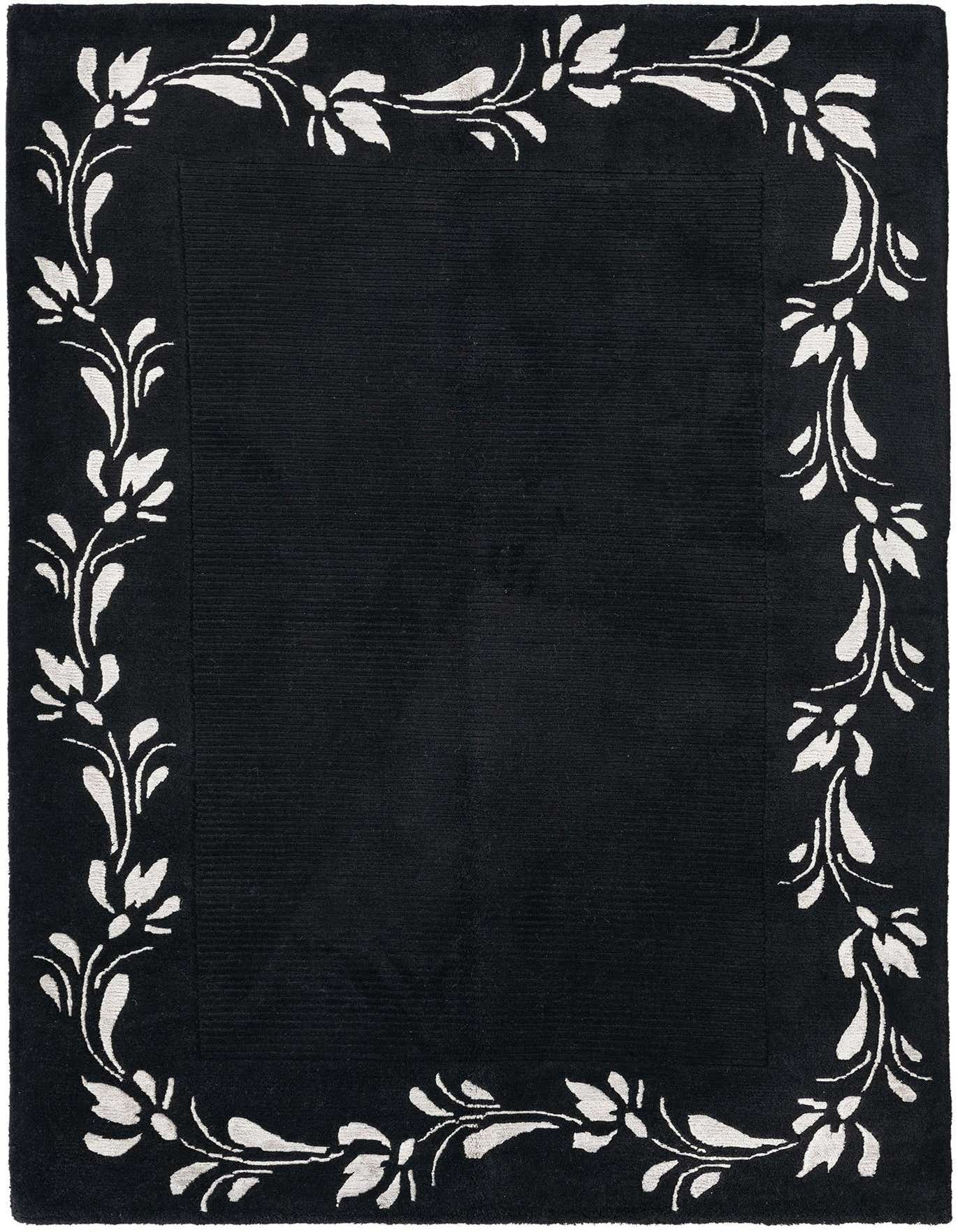A 3x5 rectangular black area rug with a contrasting white floral vine border, showcasing a modern Persian style.