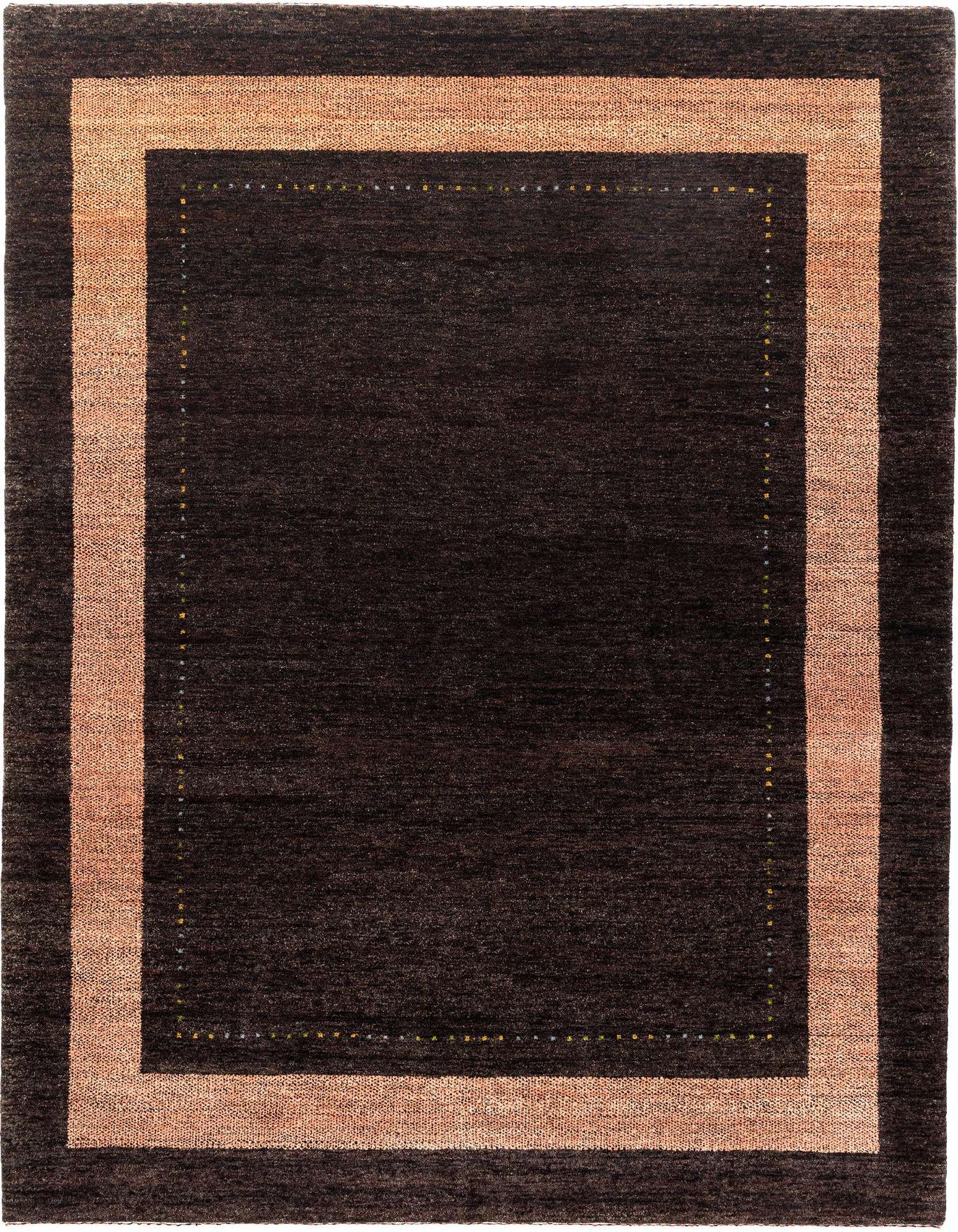 A 5x7 rectangular black wool rug with a wide peach-colored border and subtle multicolor dotted accents.
