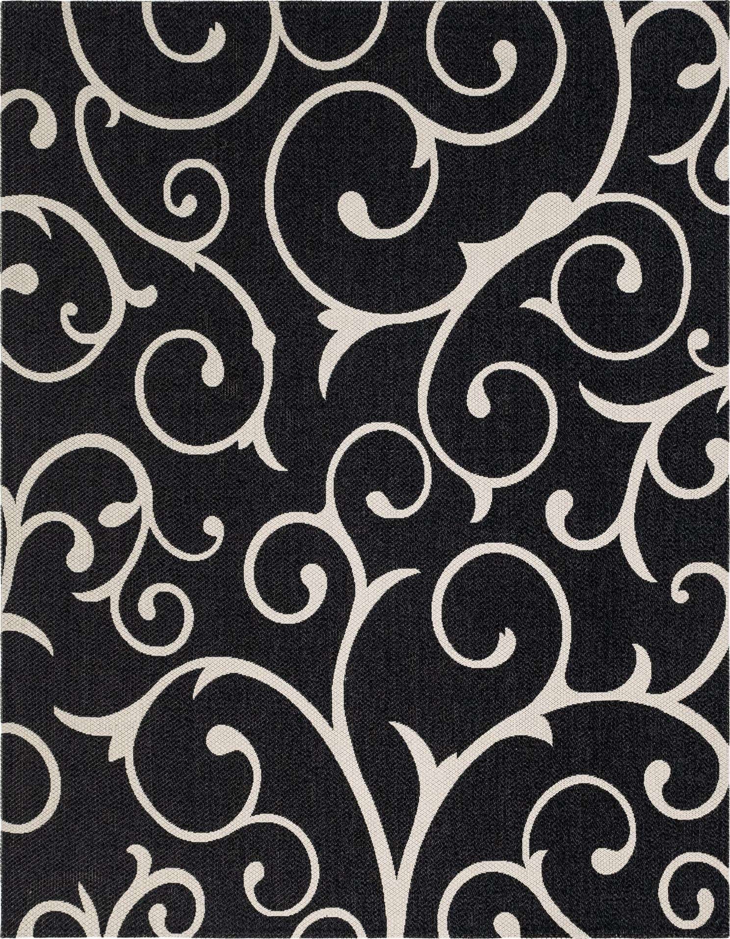 A 7x10 rectangular black rug with an intricate, swirling off-white floral and vine pattern, showcasing a flatweave texture.
