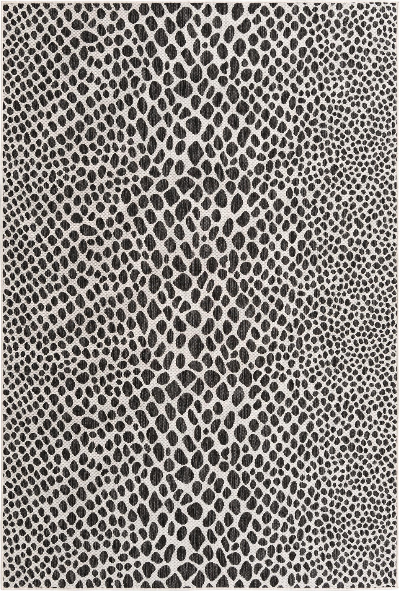 A 6x9 rectangular black and white modern rug with an abstract zebra-like pattern, suitable for indoor or outdoor use.